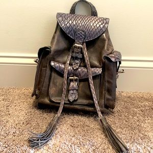 Freebird 100% full grain leather mini backpack.